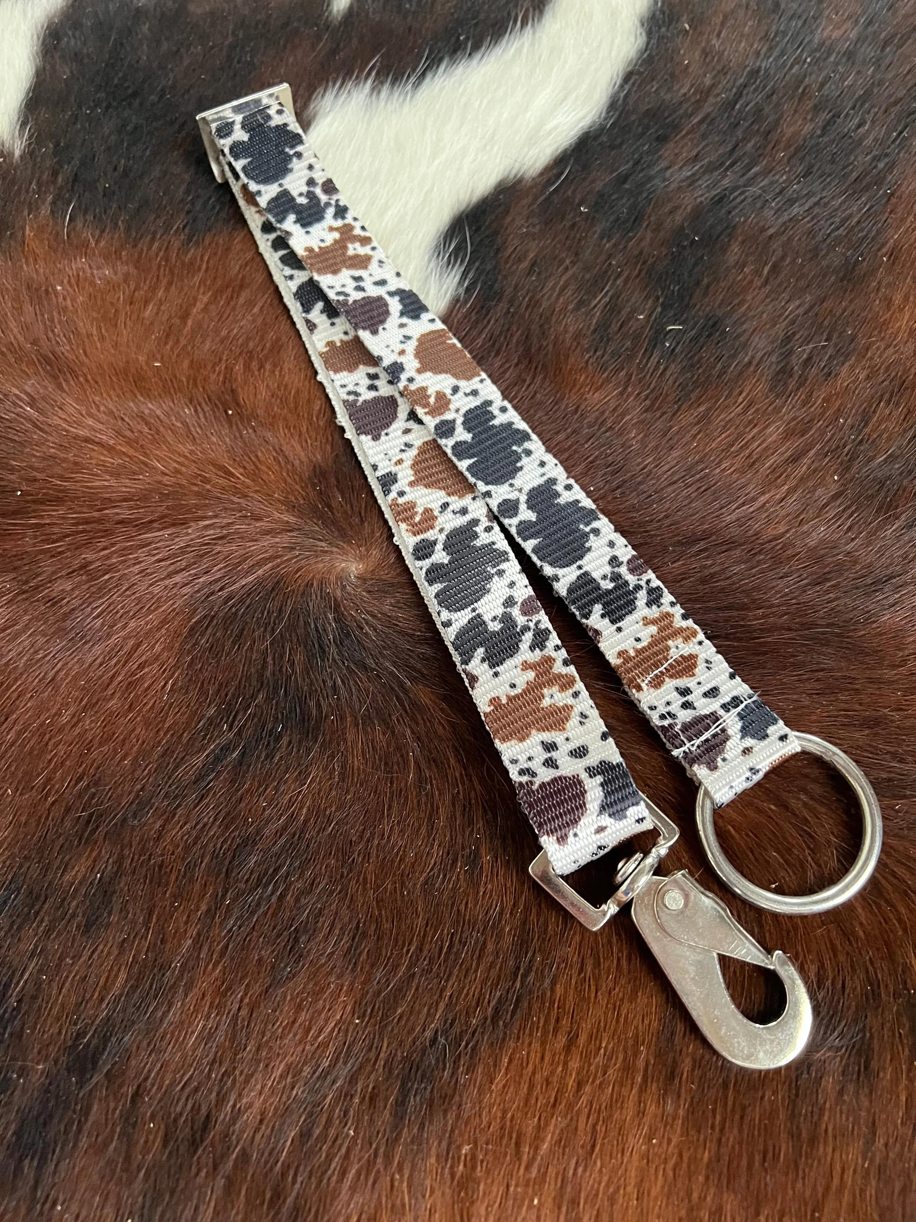 1" Cow Print nylon adjustable bucket hanger with snap and ring
