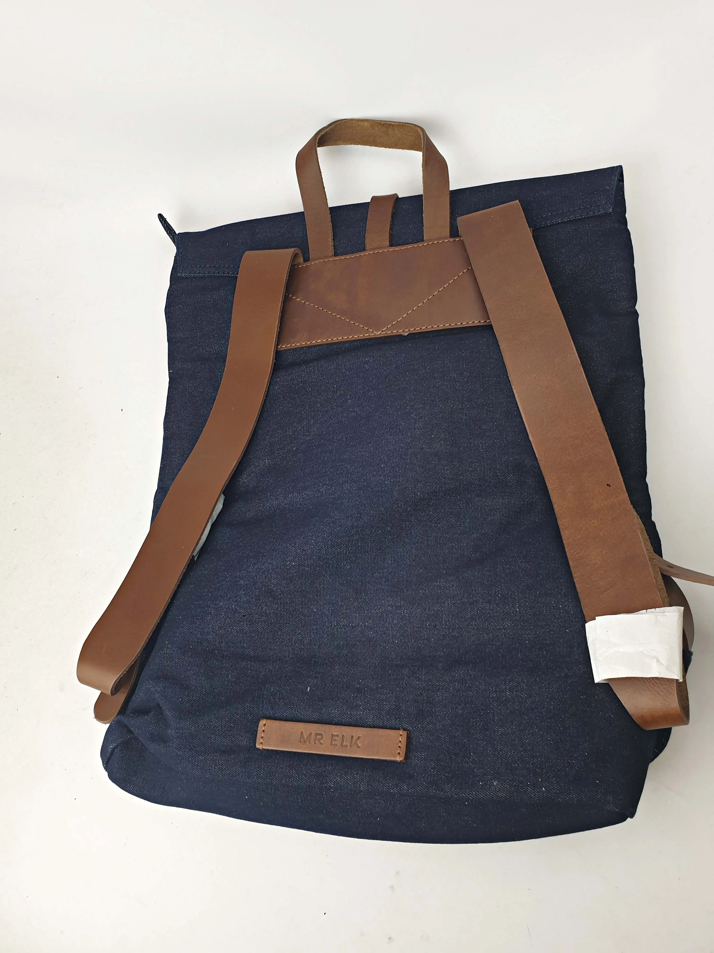 Elk denim and brown leather backpack