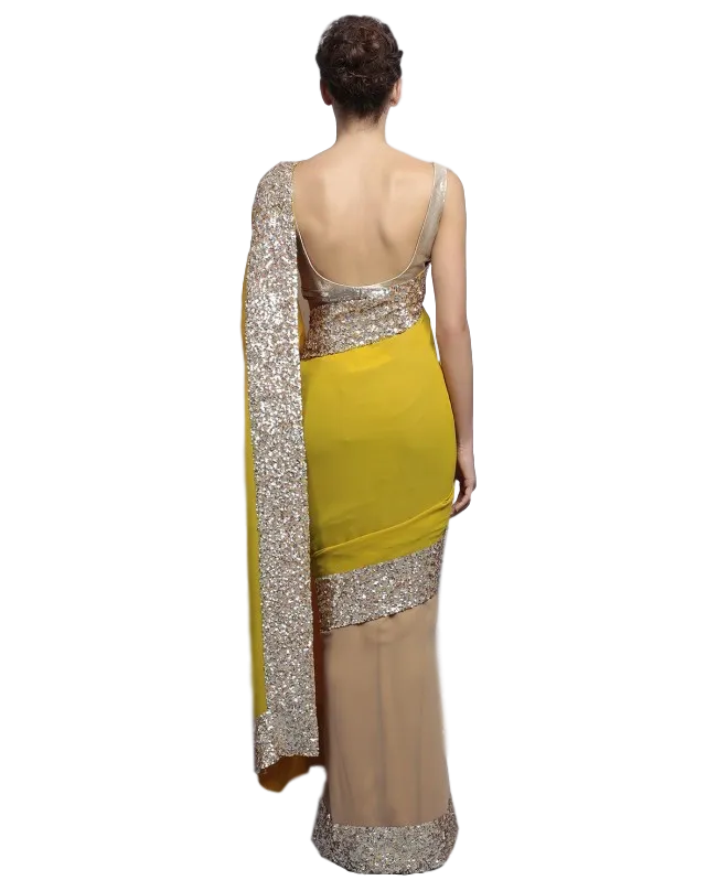Fawn and yellow color party wear saree