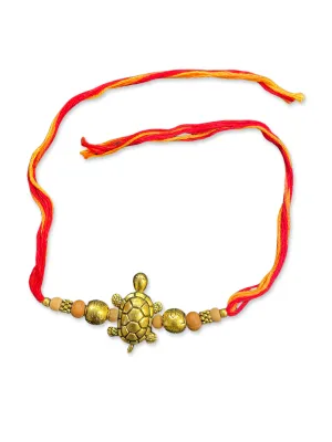 Gold Plated Tortoise Designer Rakhi Bracelet With Multicolor Thread For Raksha Bandhan