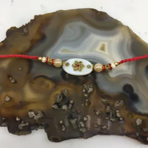 Kundan Designer Rakhi Flower Designs With Pearls & Golden Stone Red Thread Rakhi For Raksha Bandhan