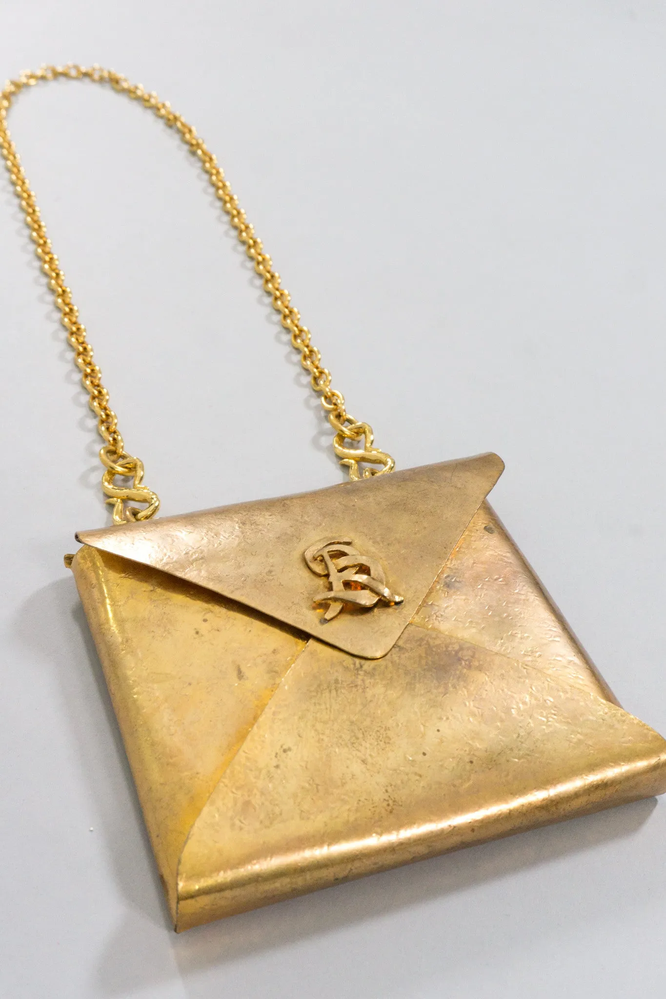 Monogram Brass Envelope Chain Bag