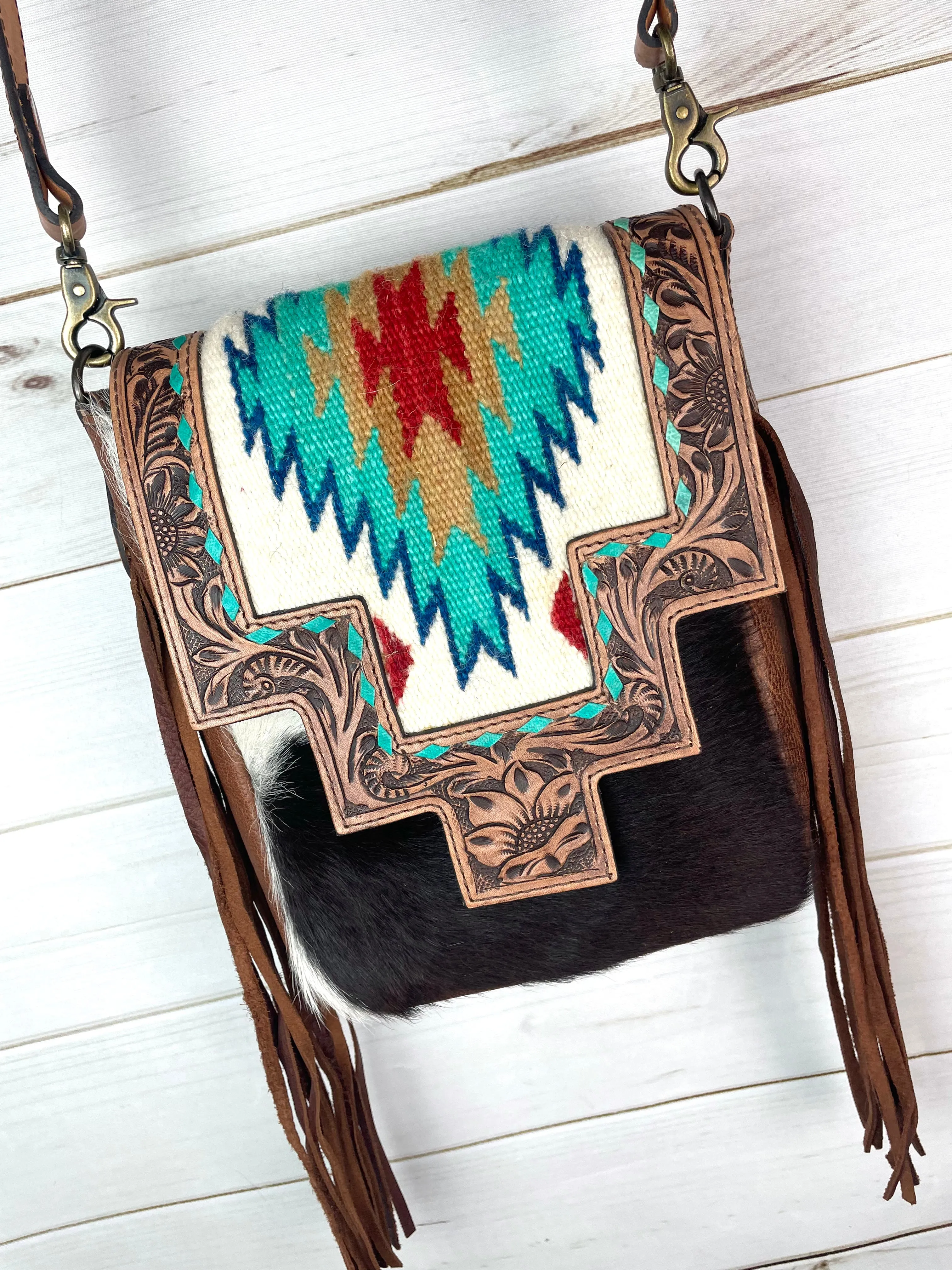 Monument Turquoise Wool Pattern Inset Tooled Leather Over Hide