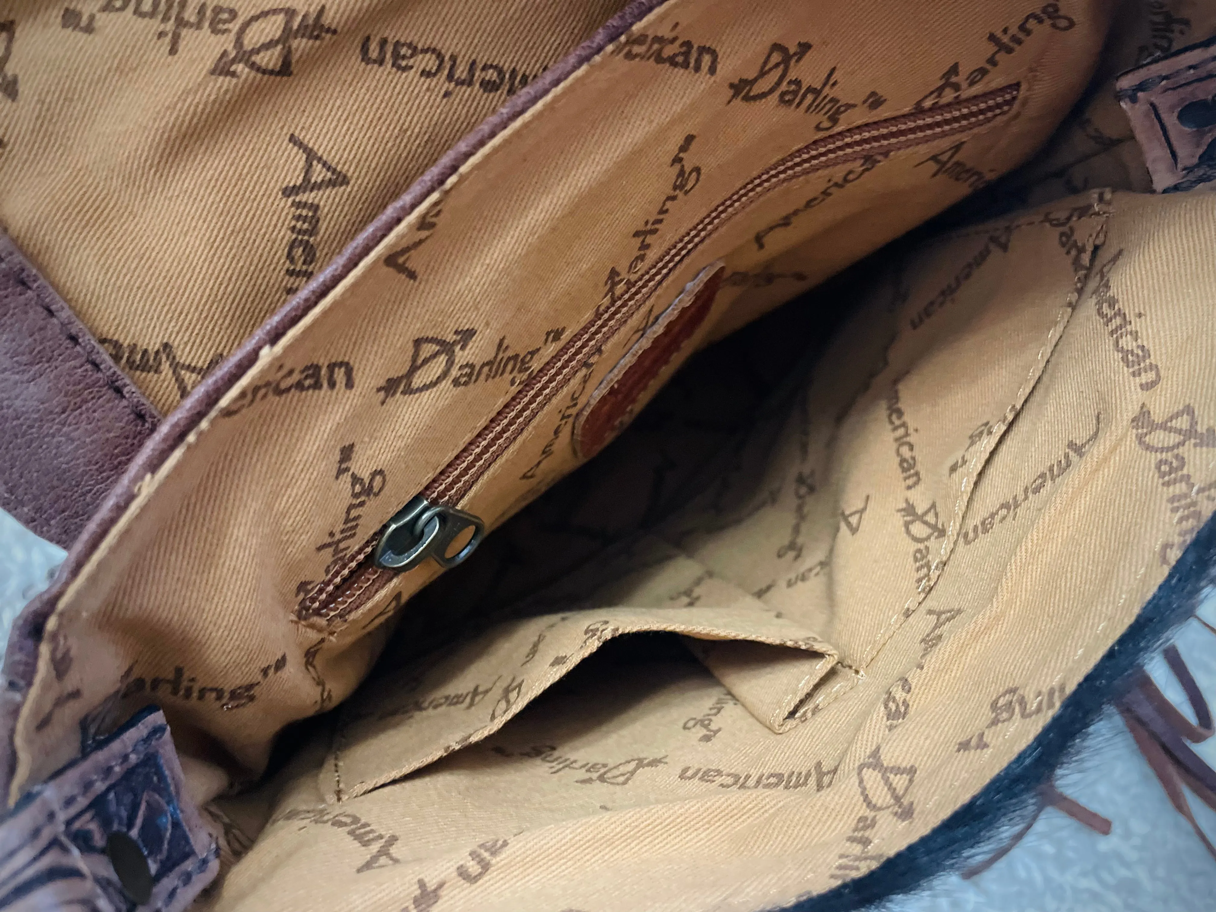 Monument Turquoise Wool Pattern Inset Tooled Leather Over Hide