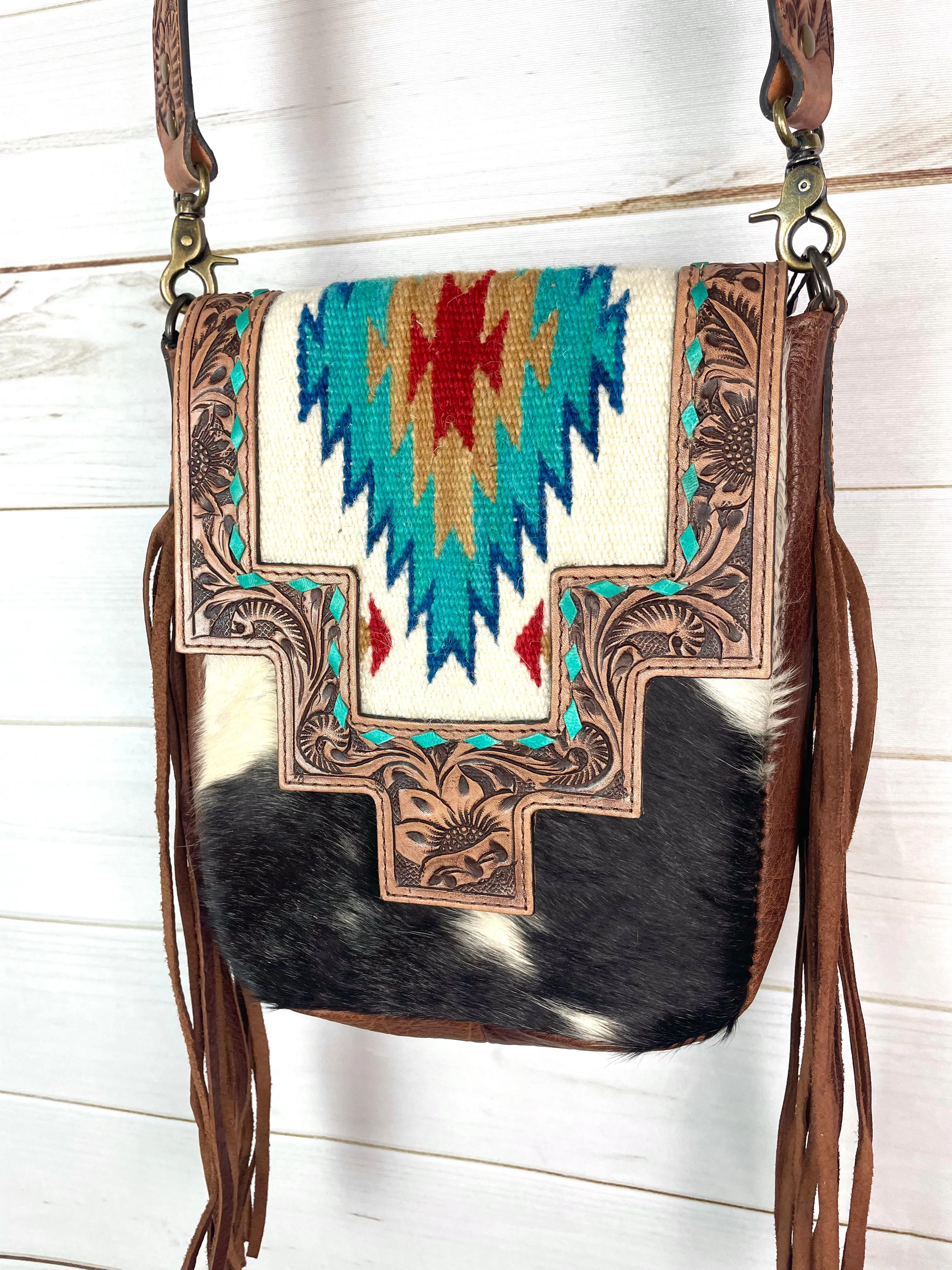 Monument Turquoise Wool Pattern Inset Tooled Leather Over Hide
