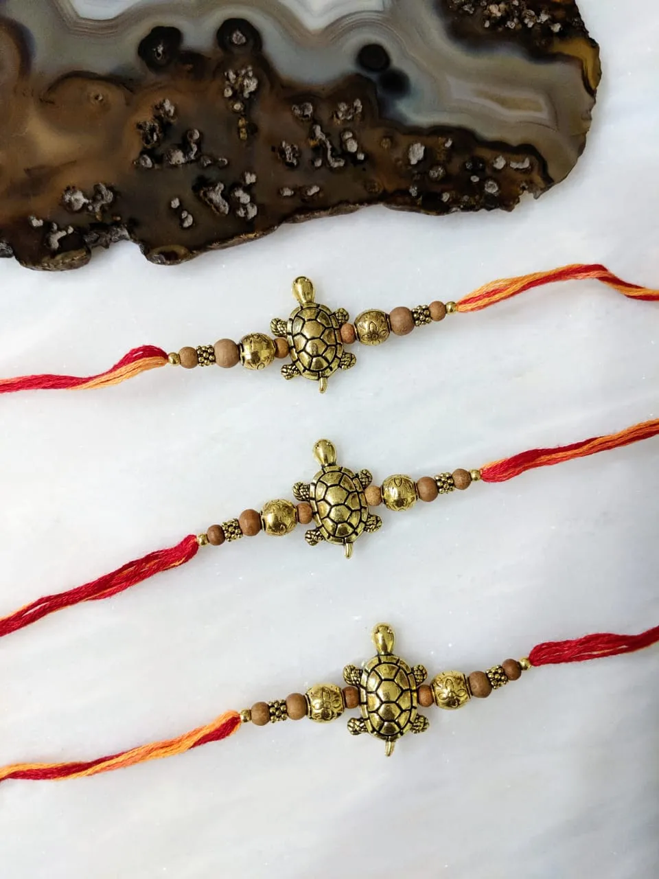 (Set of 3) Tortoise Rakhi for Men Gold Plated Multicolor Thread Rakhi