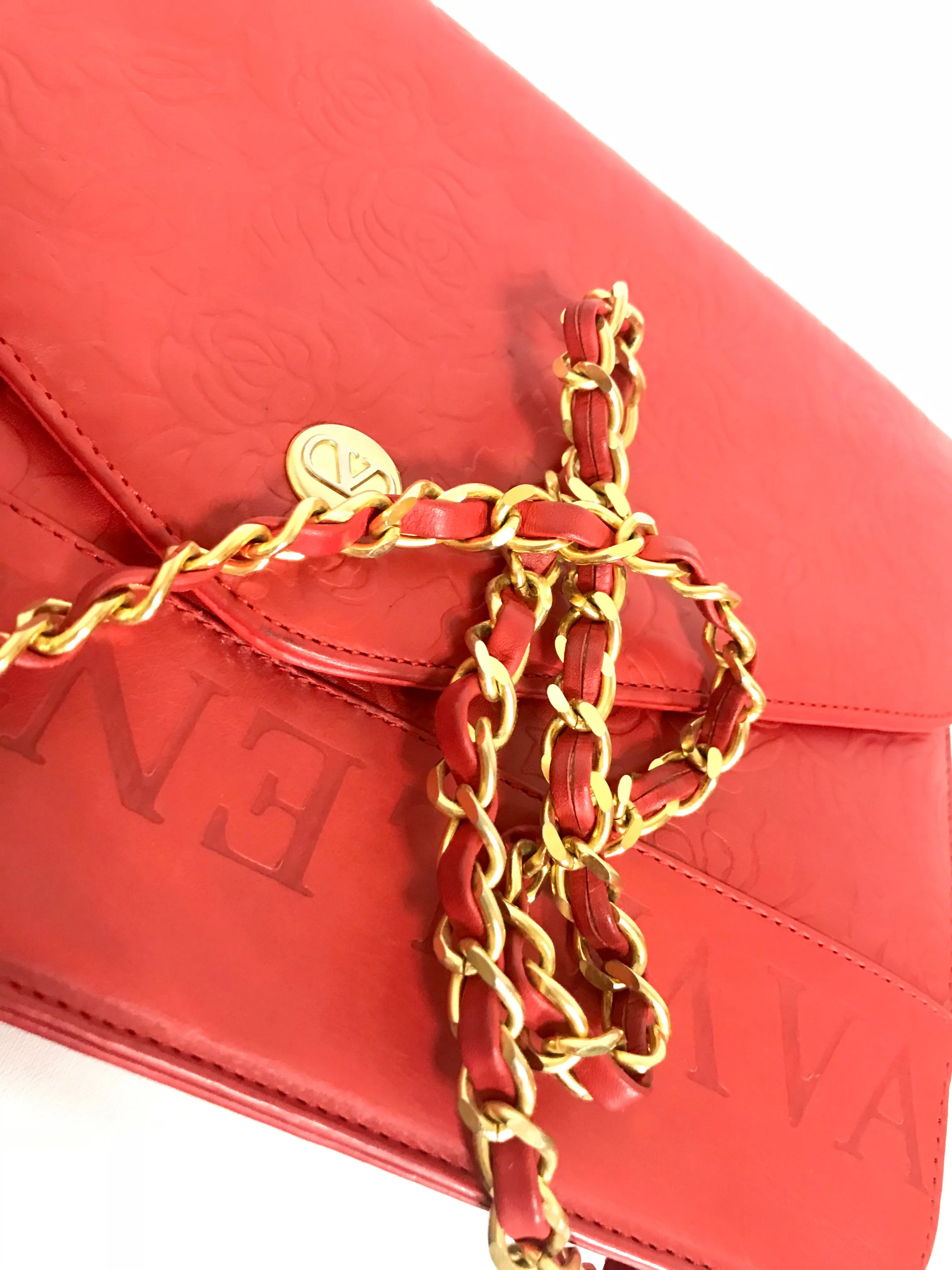 Vintage Valentino Garavani red leather chain shoulder bag with rose flower embossed design and round V motif. Can be clutch bag.