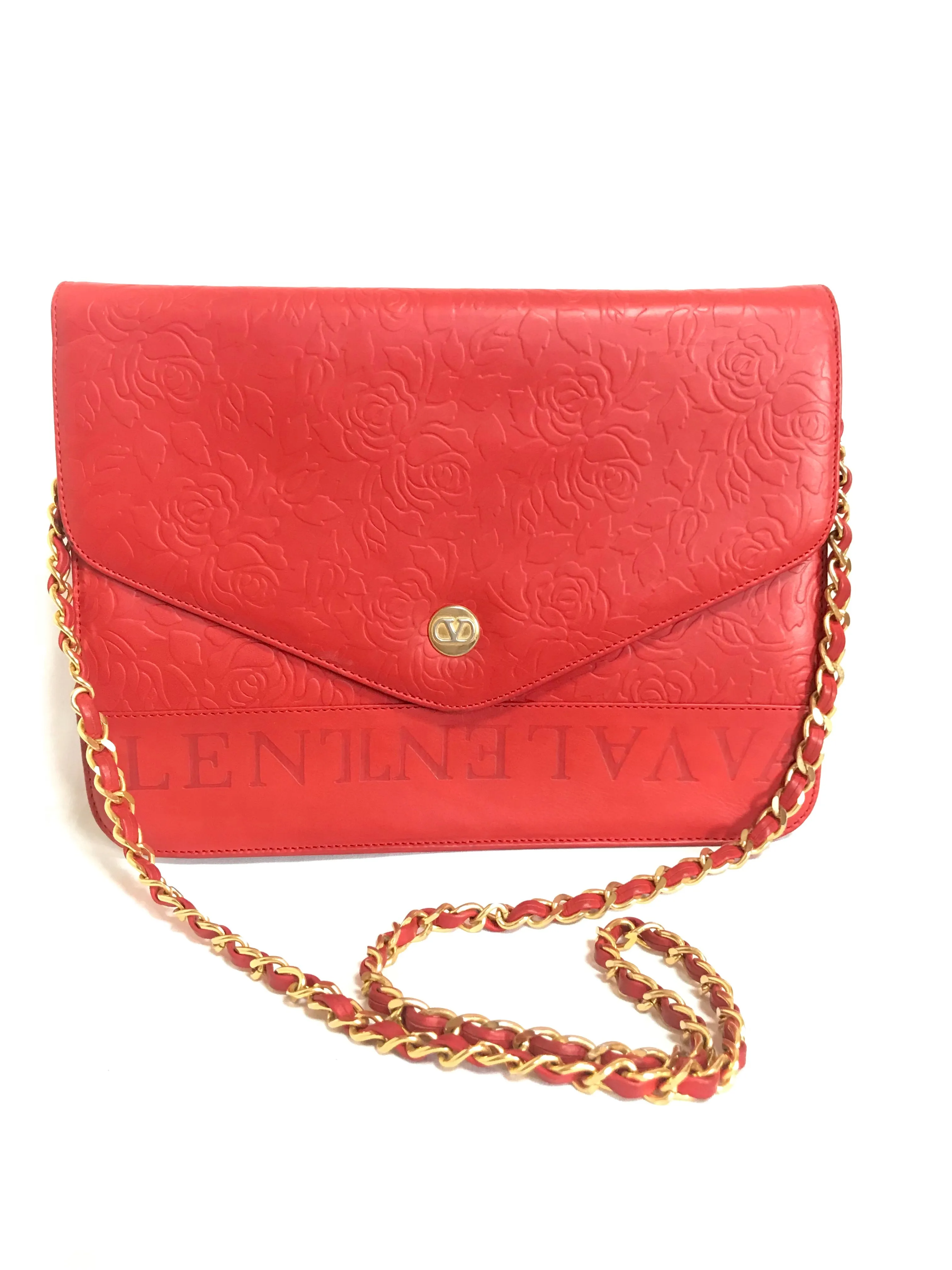 Vintage Valentino Garavani red leather chain shoulder bag with rose flower embossed design and round V motif. Can be clutch bag.